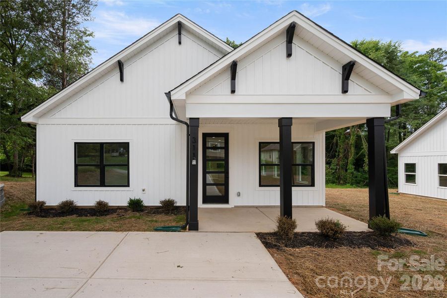 Front exterior of a new home in , Stanley, NC, highlighting curb appeal (Image 23). Front exterior of a new home in , Stanley, NC, highlighting curb appeal (Image 23).