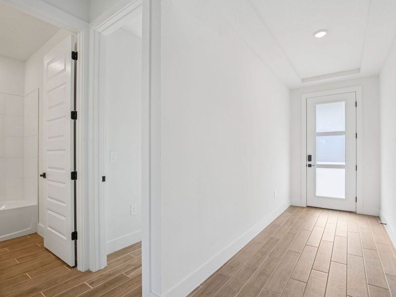 Spacious, unfurnished interior of a new home in Magnolia Bay - Reserve Series, Nokomis (Image 15).