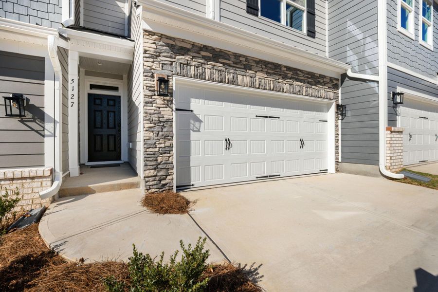 Exterior details and patio area of a home in Harbor Crossing, Greensboro (Image 3).