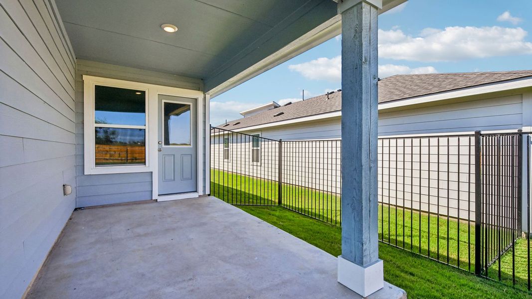 Exterior details and patio area of a home in Trails at Wildhorse, Austin (Image 3).