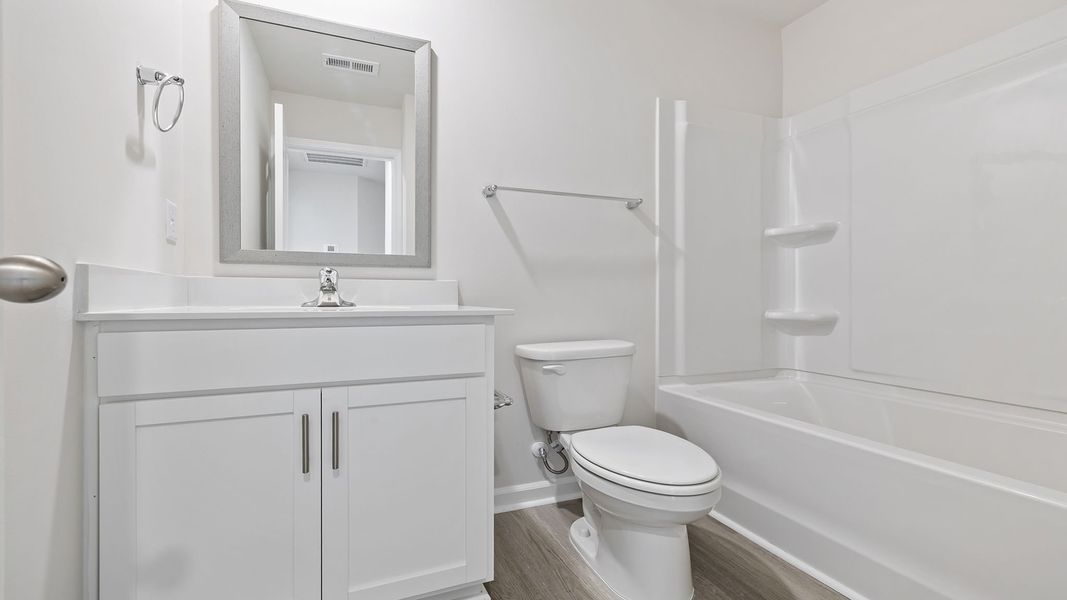 Furnished interior view inside a new home in Tanglewood Townes, Greenville (Image 9).