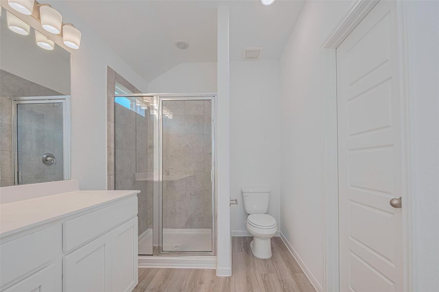 Furnished interior view inside a new home in Sunterra, Katy (Image 13).