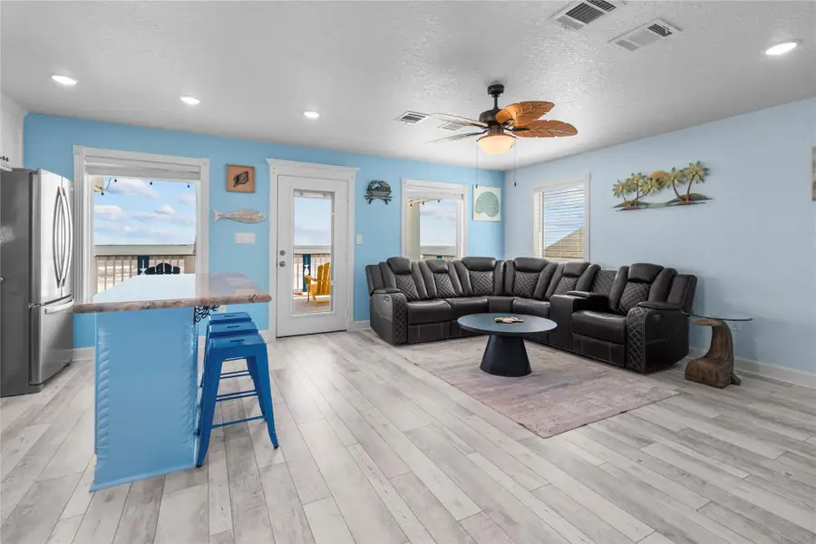 Power reclining leather sofa.