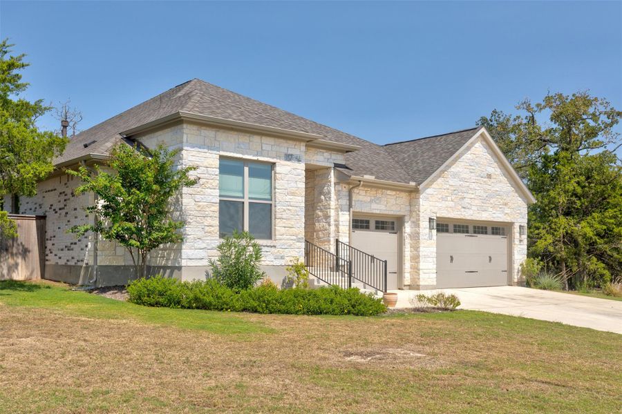 Front exterior of a new home in , Bastrop, TX, highlighting curb appeal (Image 1). Front exterior of a new home in , Bastrop, TX, highlighting curb appeal (Image 1).
