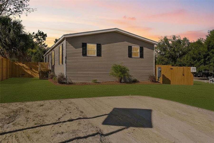 Exterior details and patio area of a home in , Brooksville (Image 27).