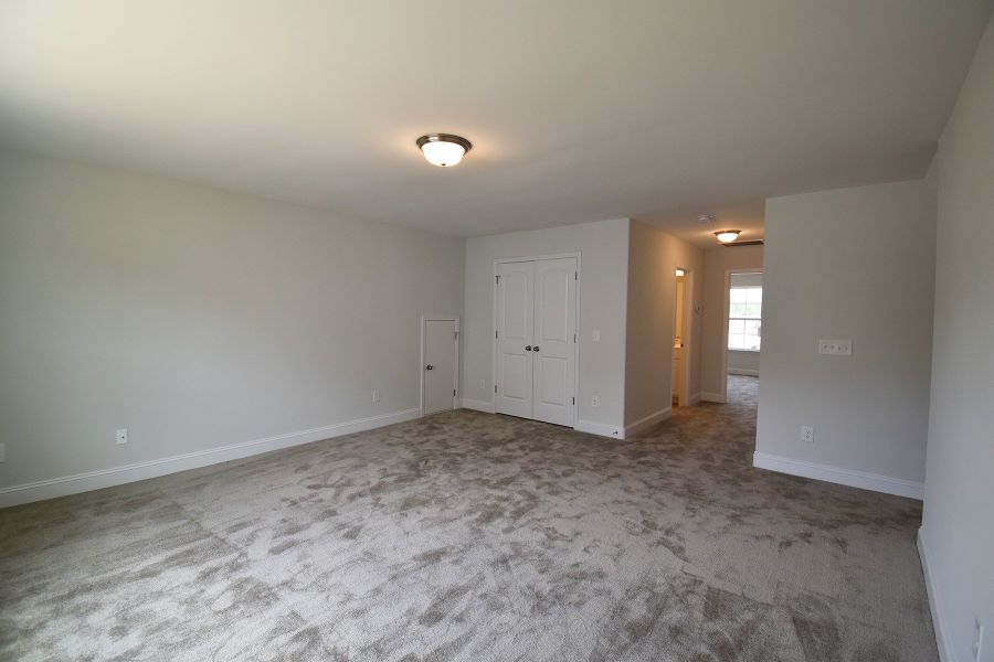 Representative unfurnished interior of a home built from the Ellerbe by Keystone Homes NC in Sullivans Reserve, Walkertown (Image 34).