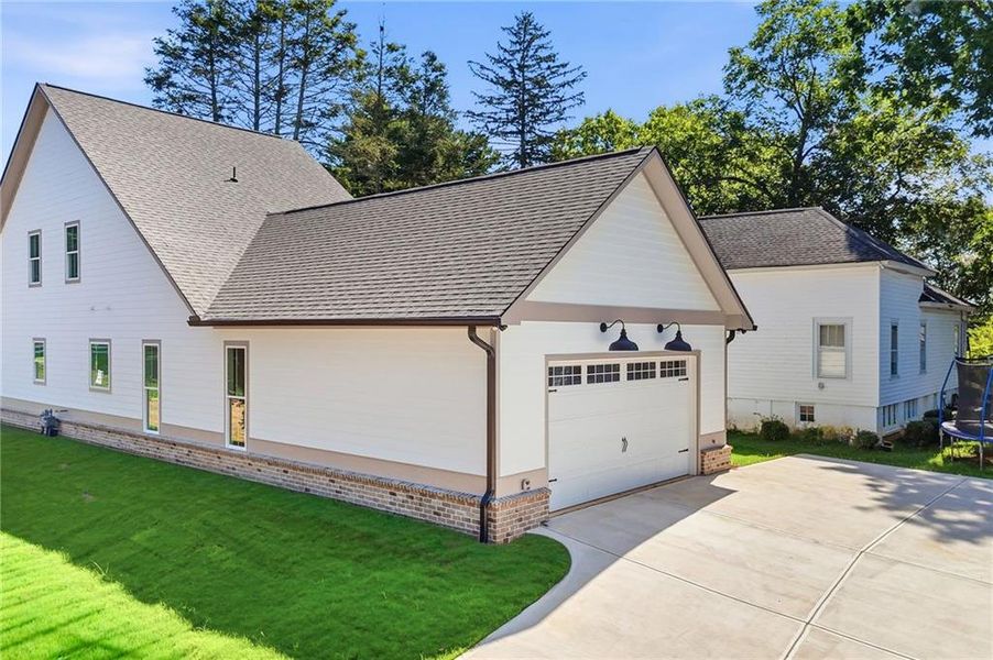 Front exterior of a new home in , Ball Ground, GA, highlighting curb appeal (Image 31).