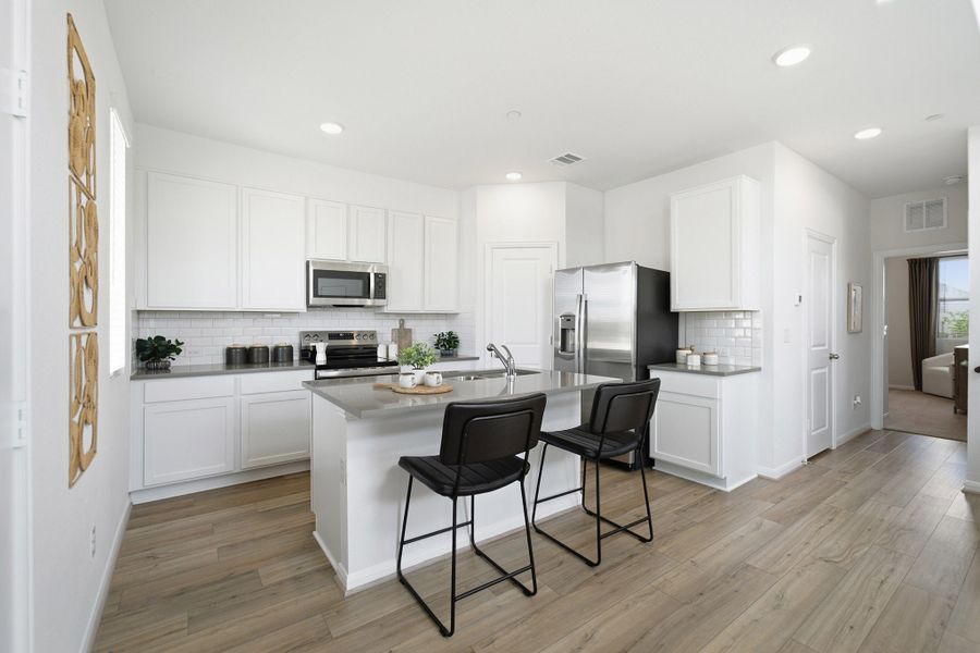 Representative furnished interior of a home built from the Eames by CastleRock Communities in Municipal Drive Townhomes, Leander (Image 6). Representative furnished interior of a home built from the Eames by CastleRock Communities in Municipal Drive Townhomes, Leander (Image 6).