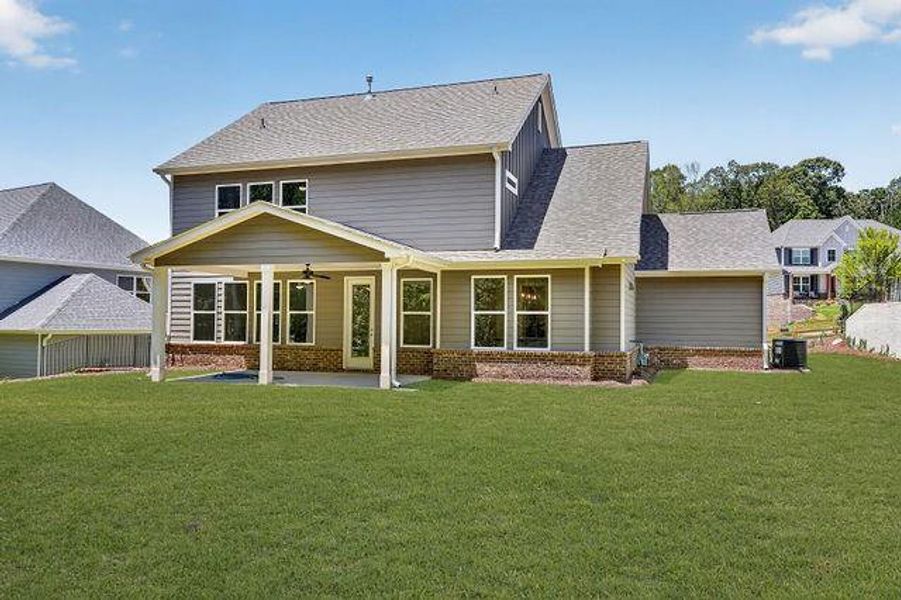 Exterior details and patio area of a home in The Manor at Gainesville Township, Gainesville (Image 3).