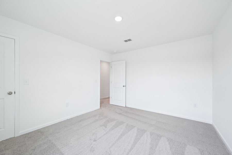 Representative unfurnished interior of a home built from the Meadow by Ashton Woods in Middleton Farms, Middlesex (Image 23).