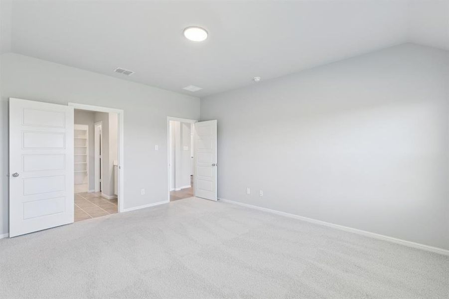 Primary Suite in the Harrison home plan by Trophy Signature Homes – REPRESENTATIVE PHOTO Primary Suite in the Harrison home plan by Trophy Signature Homes – REPRESENTATIVE PHOTO