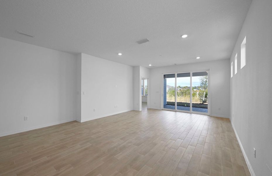 Spacious, unfurnished interior of a new home in Del Webb Wildlight, Yulee (Image 13).