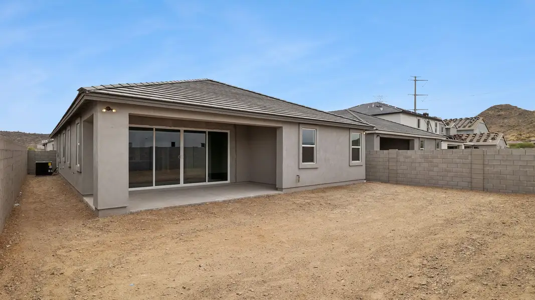 Exterior details and patio area of a home in The Ridge at Stone Butte, Phoenix (Image 2).