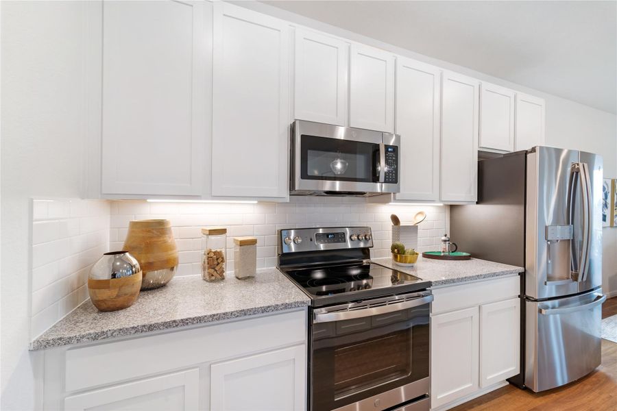 Furnished interior view inside a new home in Sweetgrass Village, Crosby (Image 10).