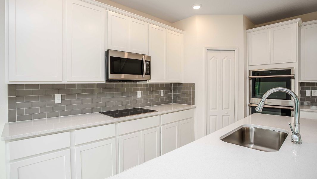 Furnished interior view inside a new home in Enclave At Seminole Palms, Palm Coast (Image 38). Furnished interior view inside a new home in Enclave At Seminole Palms, Palm Coast (Image 38).