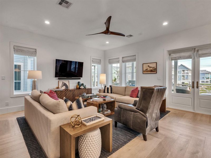 This living area captures the heart of coastal comfort — bathed in sunlight, filled with soft breezes, and designed for relaxing gatherings that flow effortlessly from indoors to out. This living area captures the heart of coastal comfort — bathed in sunlight, filled with soft breezes, and designed for relaxing gatherings that flow effortlessly from indoors to out.