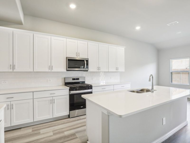Furnished interior view inside a new home in Lakehaven - Premier Series, Farmersville (Image 7).