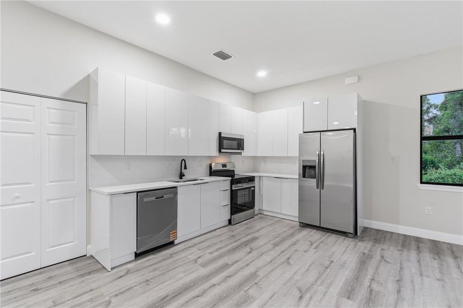Furnished interior view inside a new home in , Lehigh Acres (Image 5).