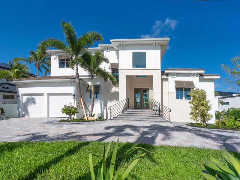 Front exterior of a new home in , Sarasota, FL, highlighting curb appeal (Image 30).