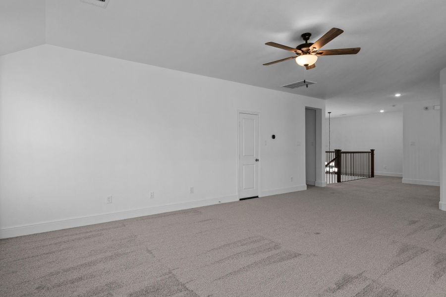 Spacious, unfurnished interior of a new home in Coastal Point, League City (Image 25). Spacious, unfurnished interior of a new home in Coastal Point, League City (Image 25).