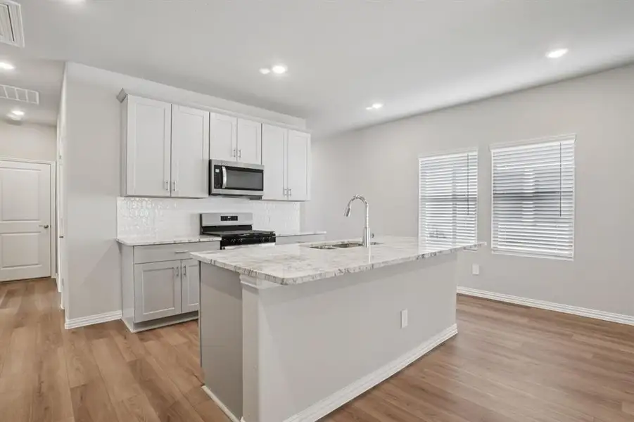 Photo is not of the actual home, but is an inspirational photo of builder’s model home and may depict options, furnishings, and/or decorator features that are not included.