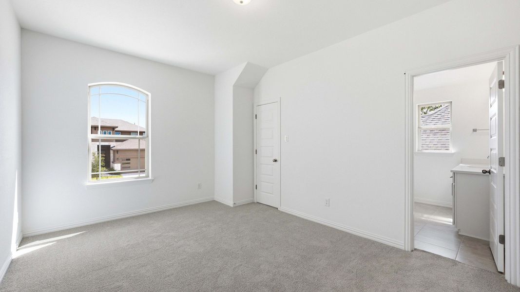 Furnished interior view inside a new home in Oaks at San Gabriel, Georgetown (Image 7).