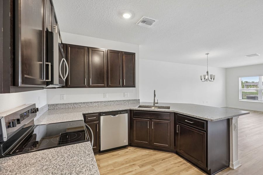 Furnished interior view inside a new home in Reserve at Forest Lake Townhomes, Lake Wales (Image 6). Furnished interior view inside a new home in Reserve at Forest Lake Townhomes, Lake Wales (Image 6).