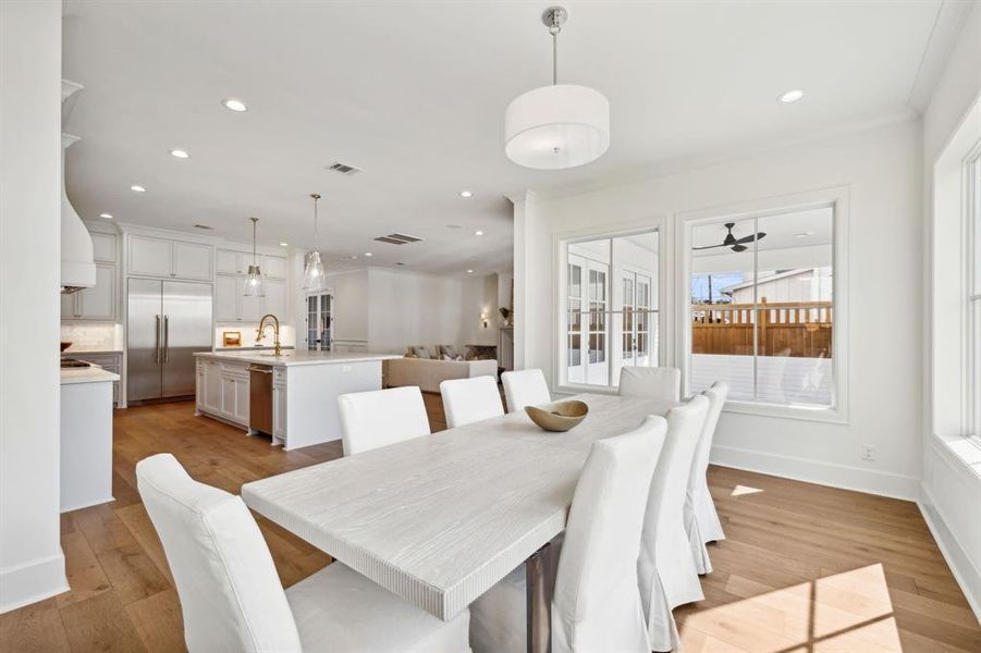 The dining room also looks out onto the rear covered porch.