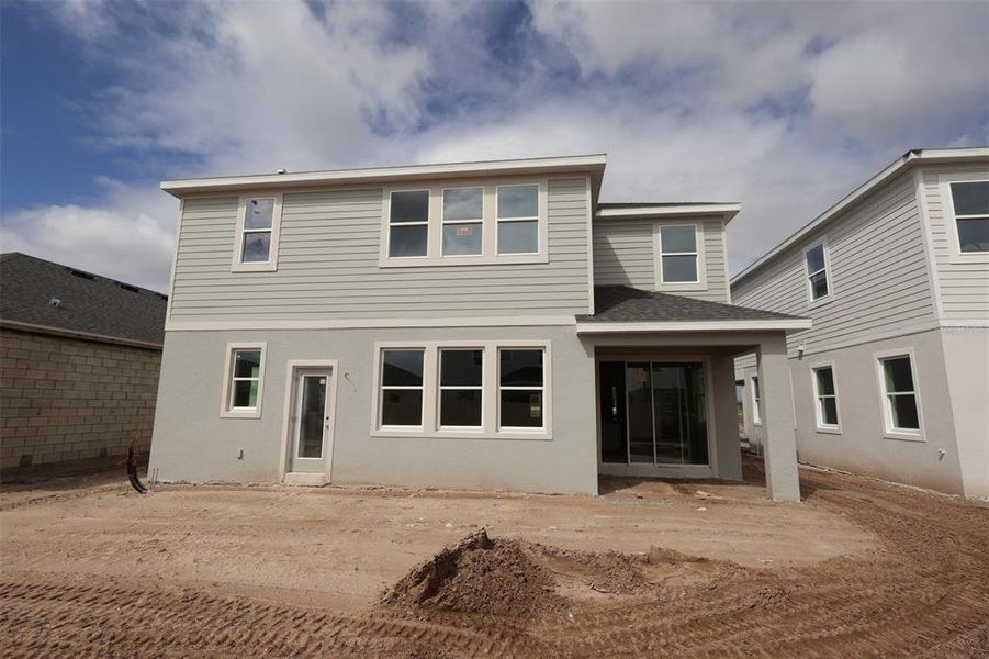 Exterior details and patio area of a home in Center Lake on the Park, St. Cloud (Image 10).
