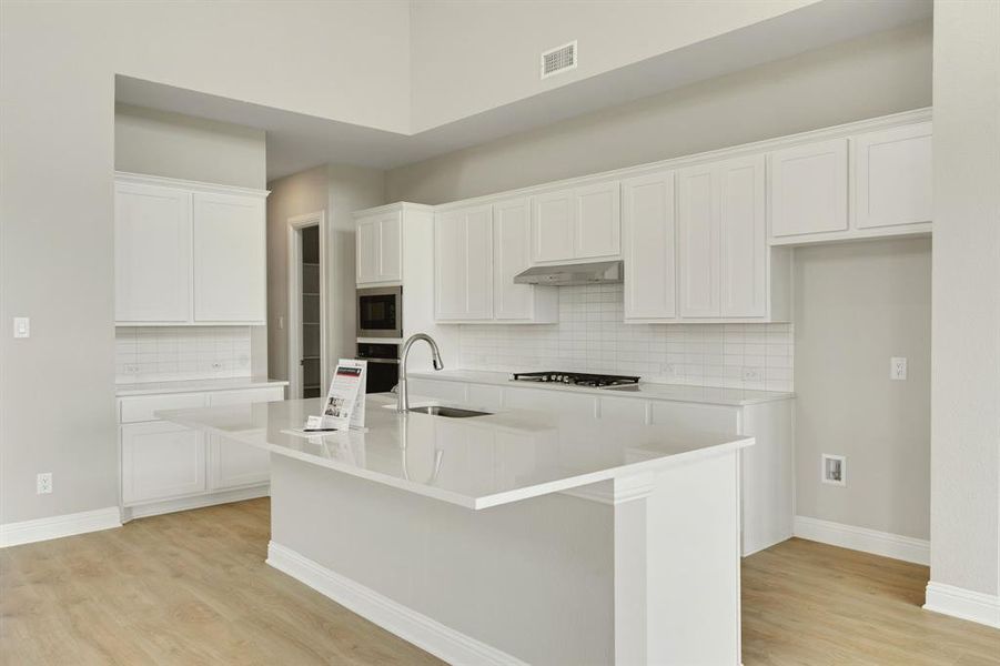 Furnished interior view inside a new home in Highland Crossing, Celina (Image 5).