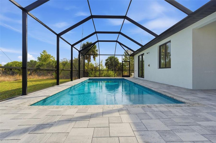 Exterior details and patio area of a home in , Port Charlotte (Image 24).