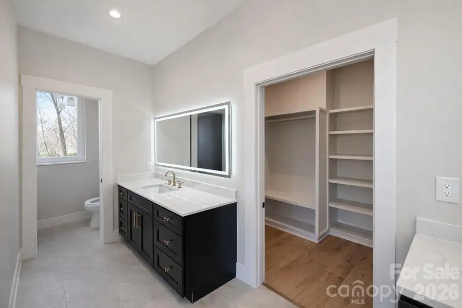 Furnished interior view inside a new home in , Black Mountain (Image 11).