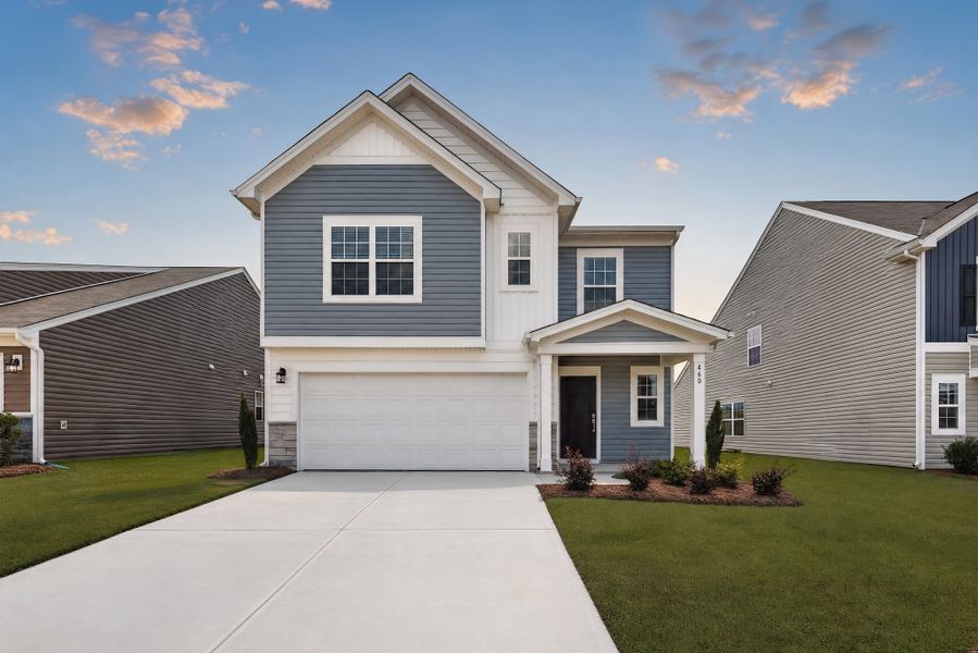 Front exterior of a new home in Heron Pointe, Gaston, SC, highlighting curb appeal (Image 1). Front exterior of a new home in Heron Pointe, Gaston, SC, highlighting curb appeal (Image 1).