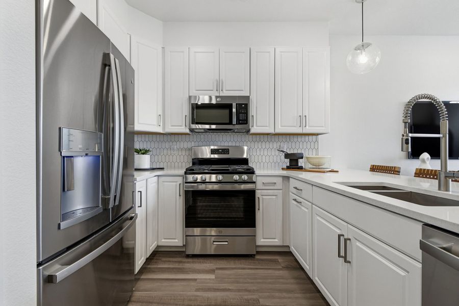 Furnished interior view inside a new home in Trailstone, Arvada (Image 6).