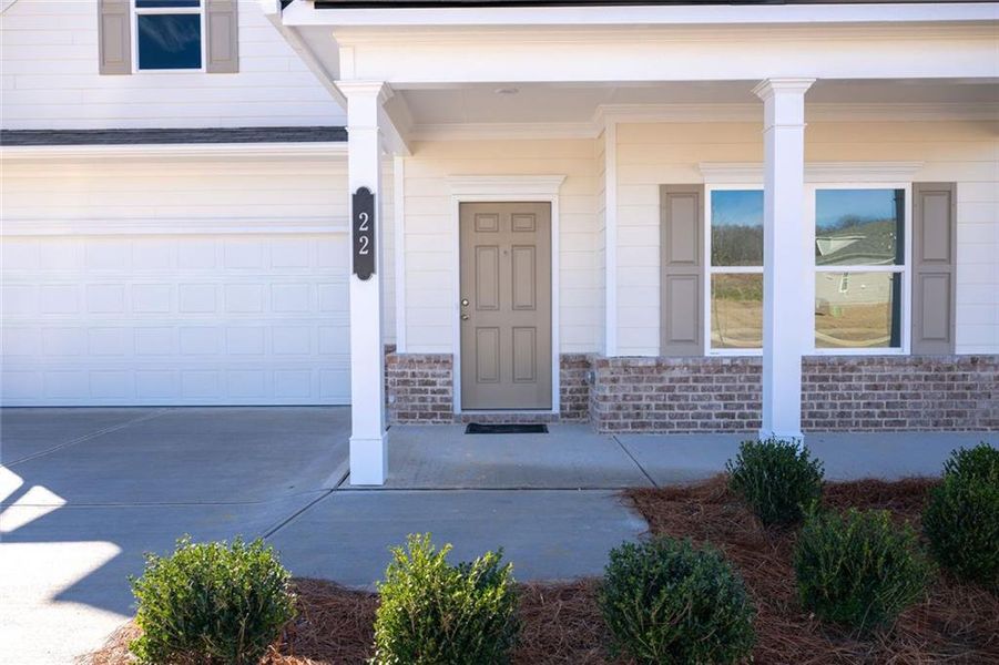 Exterior details and patio area of a home in Laurel Ridge, Rock Spring (Image 3).