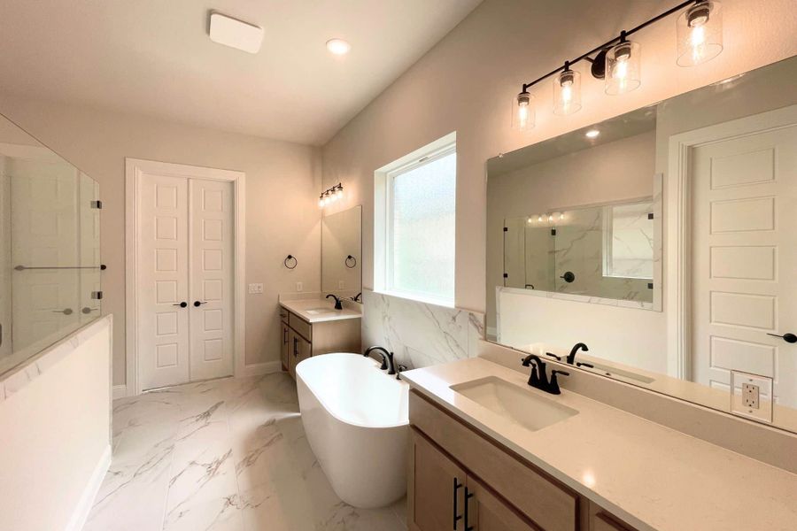 Furnished interior view inside a new home in Whisper Valley, Manor (Image 16).