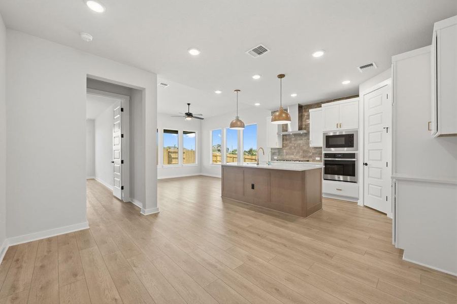 Furnished interior view inside a new home in Terrace Collection At Turner's Crossing, Buda (Image 17).