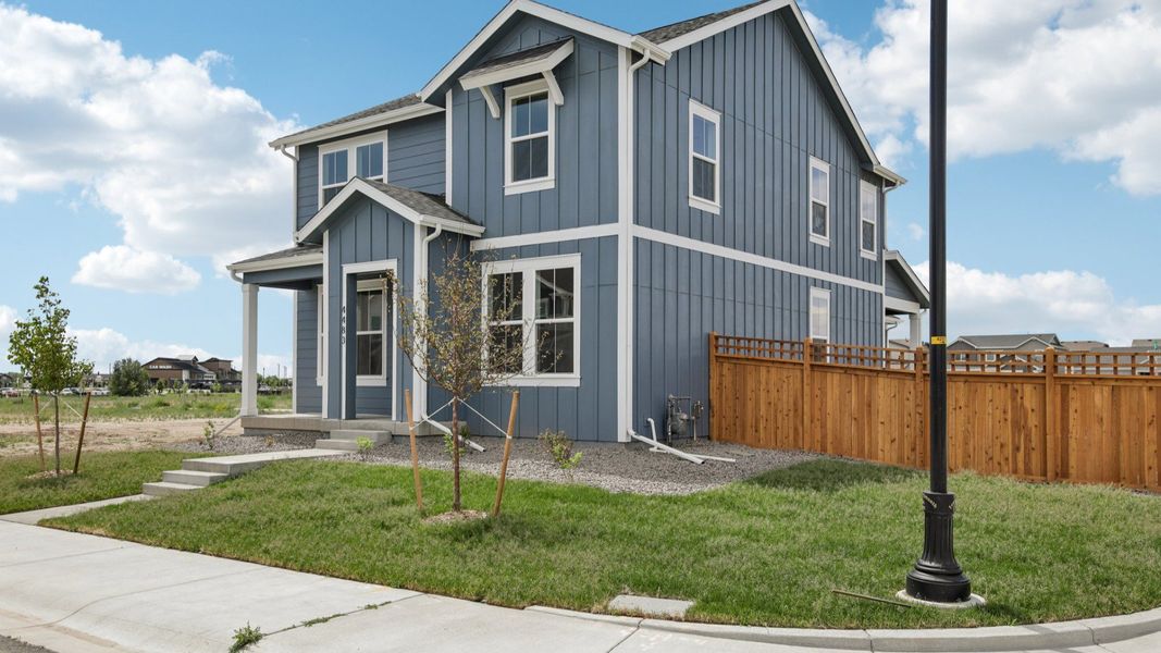 Front exterior of a new home in Timnath Lakes, Timnath, CO, highlighting curb appeal (Image 23). Front exterior of a new home in Timnath Lakes, Timnath, CO, highlighting curb appeal (Image 23).
