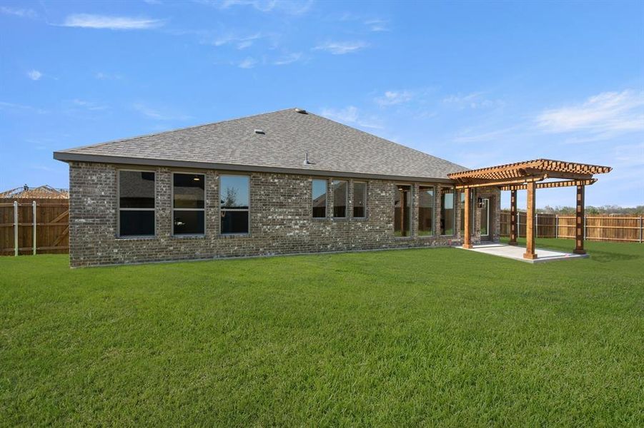 Exterior details and patio area of a home in The Retreat - Phase 1, Waxahachie (Image 4).