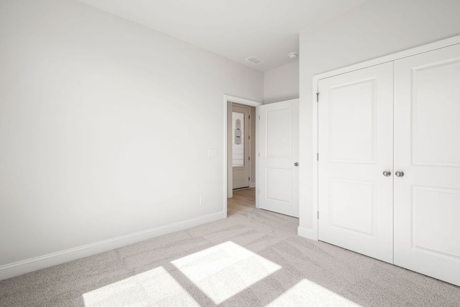 Spacious, unfurnished interior of a new home in Heartwood, Richmond Hill (Image 24).