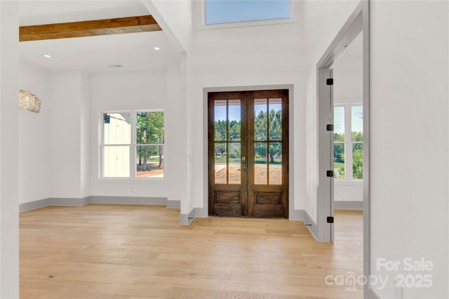 Grand entry with 12' ceiling and office off foyer Grand entry with 12' ceiling and office off foyer