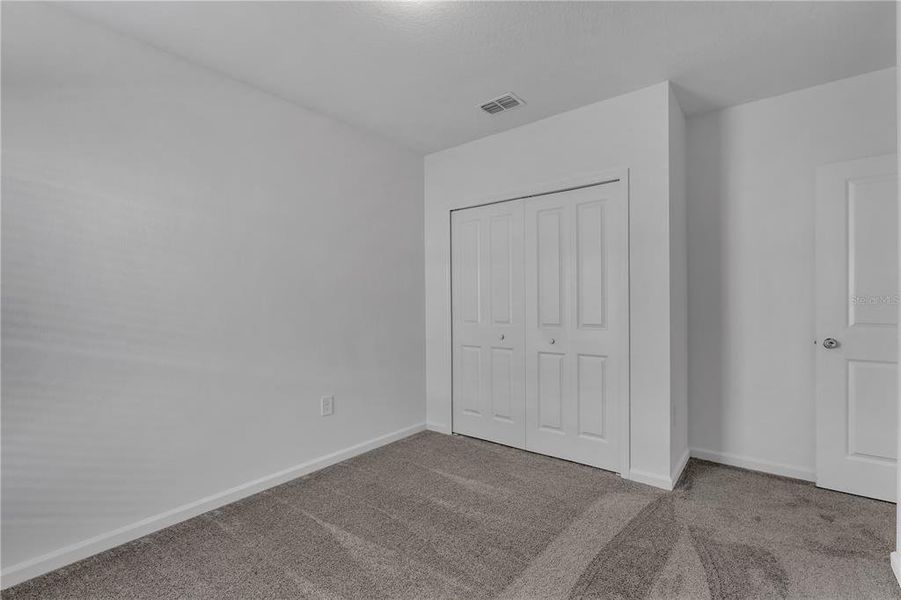 Spacious, unfurnished interior of a new home in Knightsbridge, Kissimmee (Image 30).