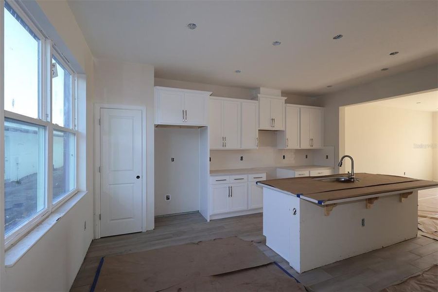 In-progress construction of a new home in Center Lake on the Park, St. Cloud, FL (Image 10).