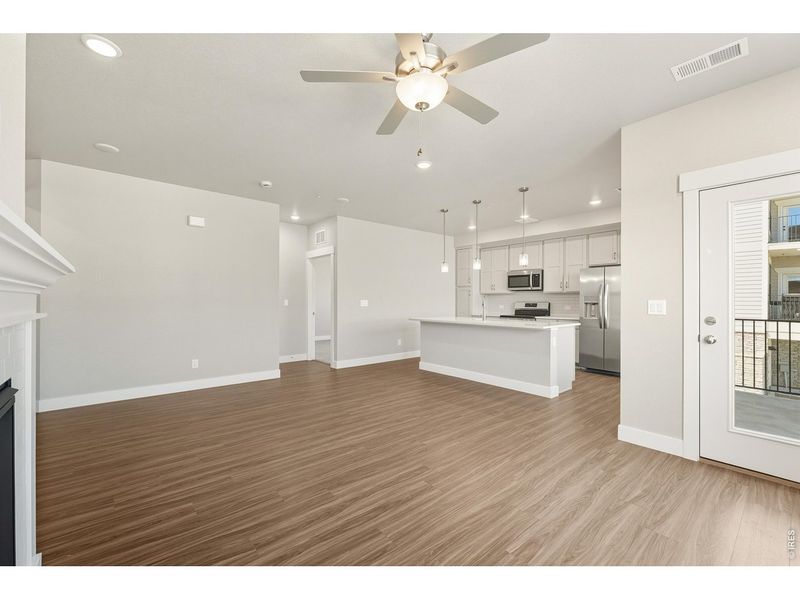Spacious, unfurnished interior of a new home in The Lakes at Centerra - North Shore Flats, Loveland (Image 11).