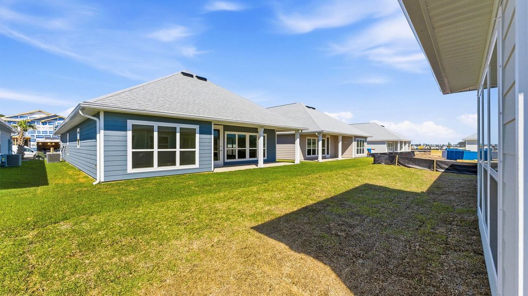 Exterior details and patio area of a home in WindMark Beach, Port Saint Joe (Image 22).