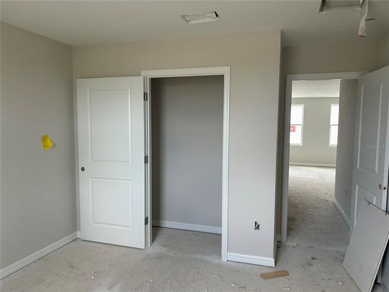 In-progress construction of a new home in Oakfield Trails Signature, Parrish, FL (Image 22).