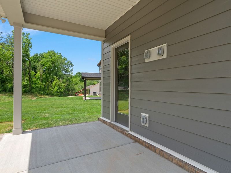 Exterior details and patio area of a home in Woods Crossing, Gallatin (Image 30).