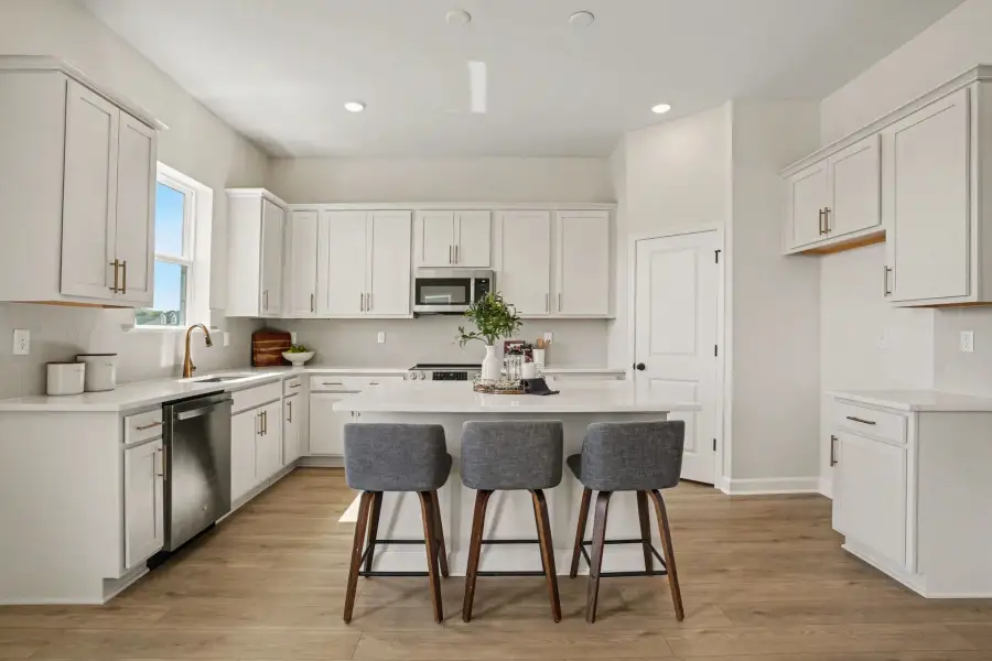 Sample Kitchen photo. Actual structural options and design finishes of home may vary.
