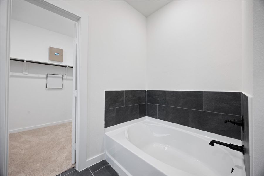 Primary bath and entry into the huge walk in Primary bath and entry into the huge walk in