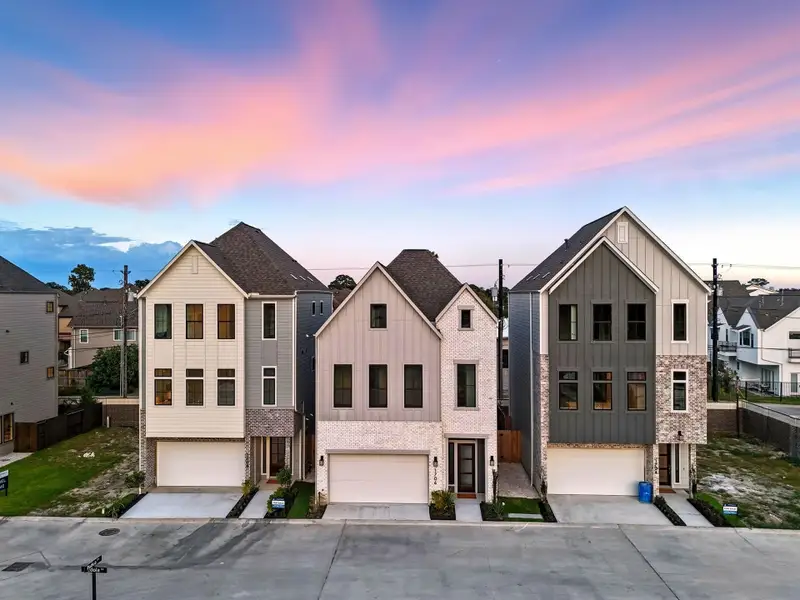 Front exterior of a new home in Spring Valley Creek, Houston, TX, highlighting curb appeal (Image 2). Front exterior of a new home in Spring Valley Creek, Houston, TX, highlighting curb appeal (Image 2).